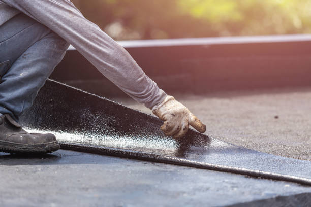 Professional Waterproofing technician working in Redgranite, WI